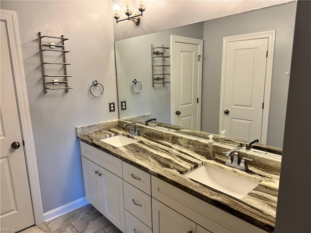 5305 Sports Club Run Unit 403, Suffolk, VA 23435 - full bathroom featuring double vanity and baseboards