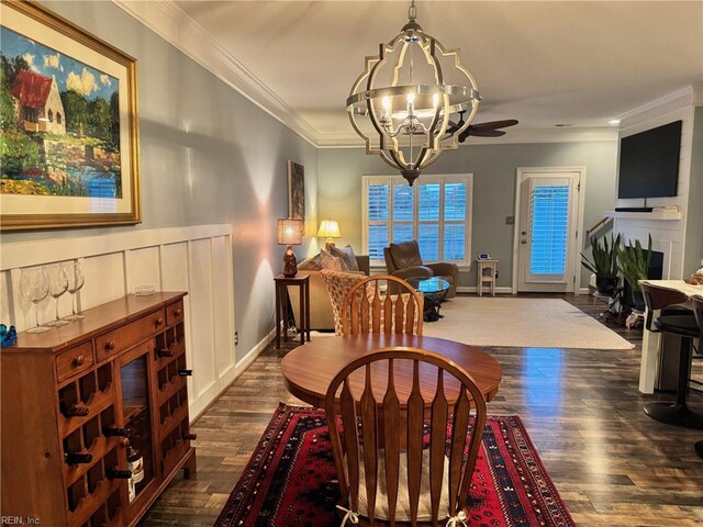 5305 Sports Club Run Unit 403, Suffolk, VA 23435 - dining space featuring dark wood-type flooring, a chandelier, crown molding, and baseboards