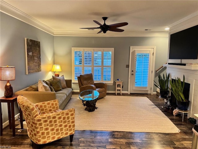 5305 Sports Club Run Unit 403, Suffolk, VA 23435 - living area featuring crown molding, ceiling fan, wood finished floors, and a fireplace with flush hearth