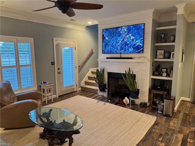 5305 Sports Club Run Unit 403, Suffolk, VA 23435 - living room featuring ornamental molding, dark wood-style floors, ceiling fan, a fireplace with flush hearth, and baseboards