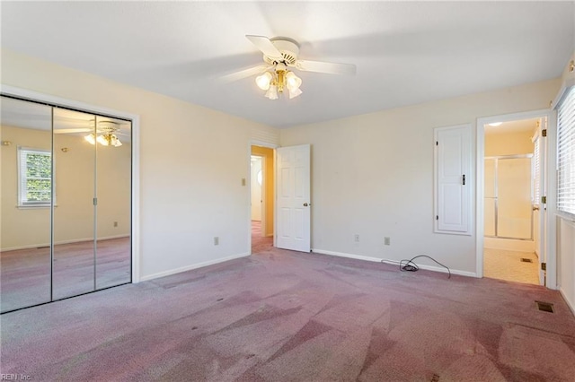 12 Critzos Ct, Hampton, VA 23669 - unfurnished bedroom with baseboards, carpet floors, a closet, ceiling fan, and ensuite bath