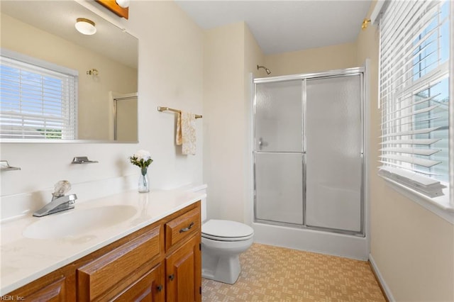12 Critzos Ct, Hampton, VA 23669 - bathroom with vanity, a shower stall, tile patterned floors, and toilet