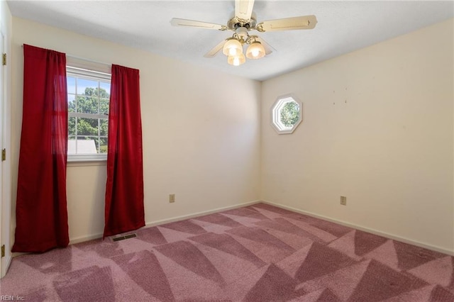 12 Critzos Ct, Hampton, VA 23669 - empty room with carpet, plenty of natural light, baseboards, and a ceiling fan