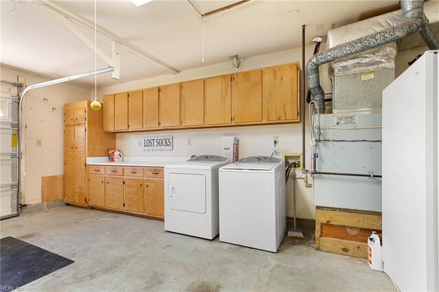 12 Critzos Ct, Hampton, VA 23669 - laundry area featuring cabinet space and washing machine and clothes dryer
