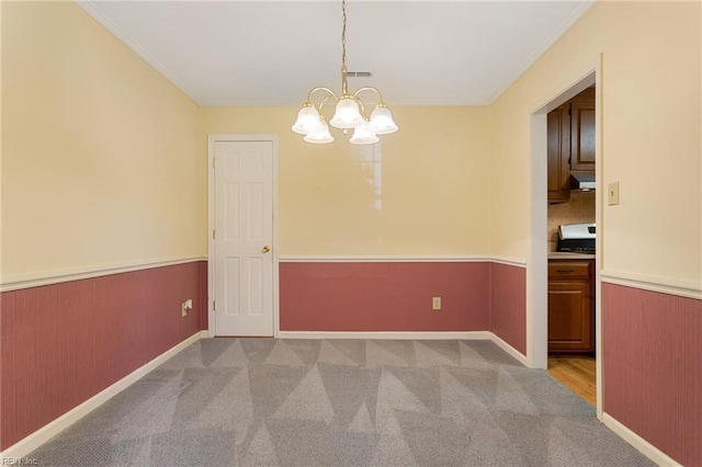 12 Critzos Ct, Hampton, VA 23669 - empty room featuring crown molding, a chandelier, carpet, baseboards, and wainscoting