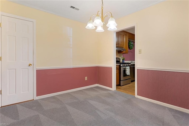 12 Critzos Ct, Hampton, VA 23669 - unfurnished dining area featuring a chandelier, a wainscoted wall, carpet, and crown molding