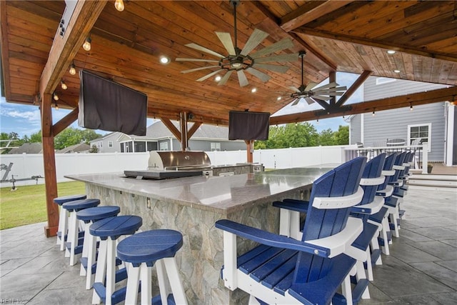 4030 Evan Cir, Suffolk, VA 23435 - view of patio with fence, exterior kitchen, and a grill