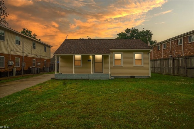 552 Ashlawn Dr, Norfolk, VA 23505 - rear view of property featuring covered porch, central AC, and roof with shingles