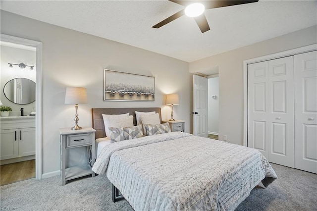 1600 Walsh Ct, Virginia Beach, VA 23454 - bedroom with carpet flooring, a closet, connected bathroom, a sink, and baseboards