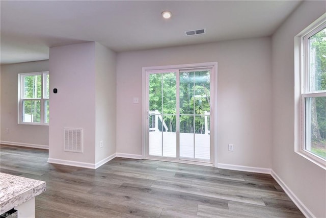 307 Lorraine Dr, Williamsburg, VA 23185 - unfurnished room featuring wood finished floors, baseboards, and recessed lighting