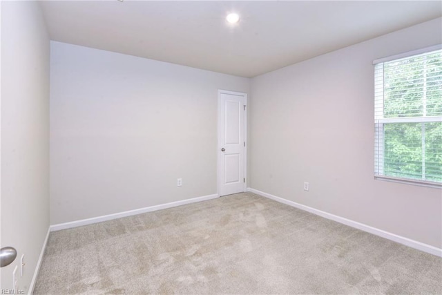307 Lorraine Dr, Williamsburg, VA 23185 - spare room with carpet and baseboards