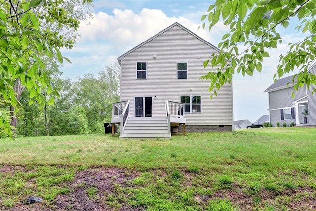 307 Lorraine Dr, Williamsburg, VA 23185 - back of house featuring a deck and a lawn