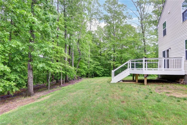 307 Lorraine Dr, Williamsburg, VA 23185 - view of grassy yard with a deck and stairway