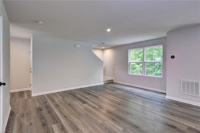 307 Lorraine Dr, Williamsburg, VA 23185 - empty room featuring wood finished floors, a smoke detector, baseboards, and recessed lighting