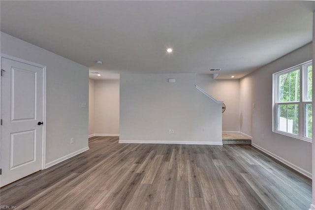 307 Lorraine Dr, Williamsburg, VA 23185 - unfurnished room with wood finished floors, stairway, baseboards, and recessed lighting