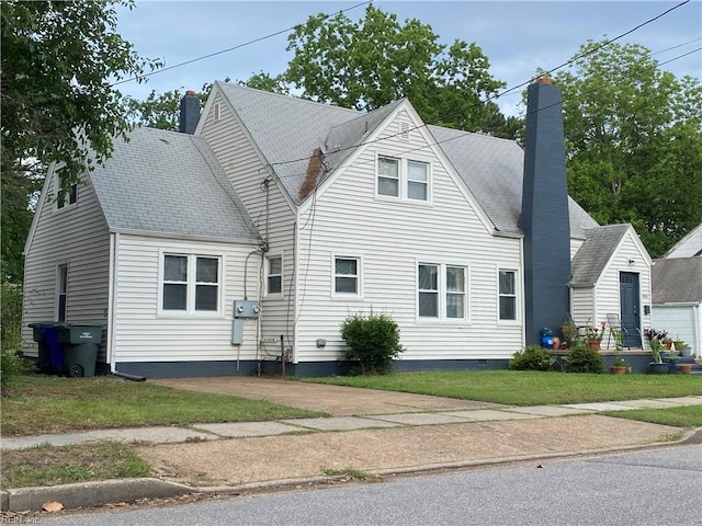 3814 Lenoir Cir, Norfolk, VA 23513 - view of front of house featuring a chimney and a front yard