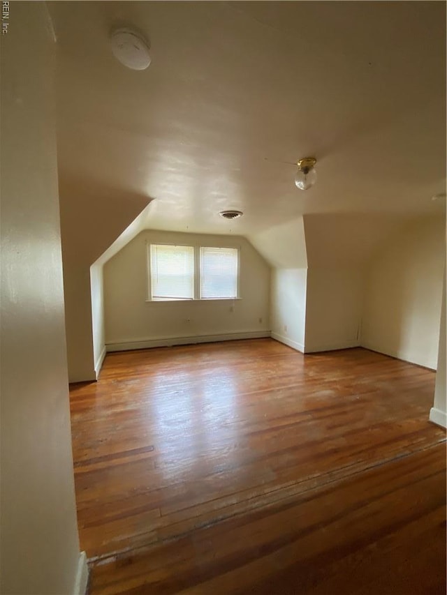 3814 Lenoir Cir, Norfolk, VA 23513 - additional living space with wood finished floors, vaulted ceiling, and baseboards