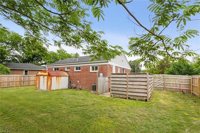 164 Findley Sq, Hampton, VA 23666 - rear view of house with brick siding, a storage shed, and an outdoor structure