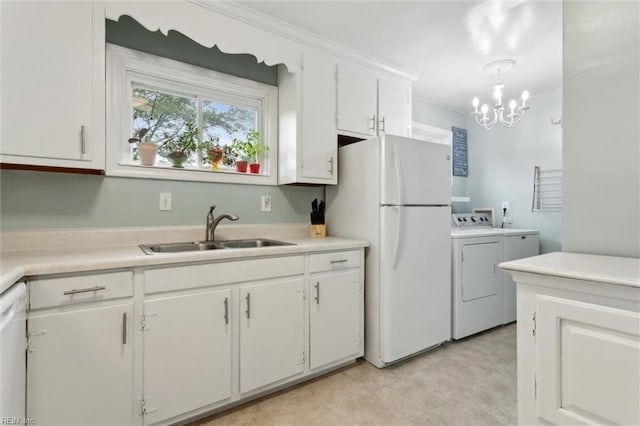 164 Findley Sq, Hampton, VA 23666 - kitchen with a sink, white appliances, independent washer and dryer, light countertops, and white cabinetry