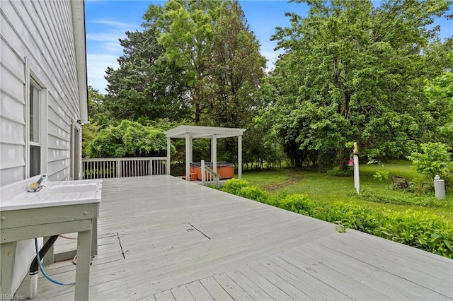 253 S George Washington Hwy, Chesapeake, VA 23323 - wooden deck featuring a hot tub and view of wooded area