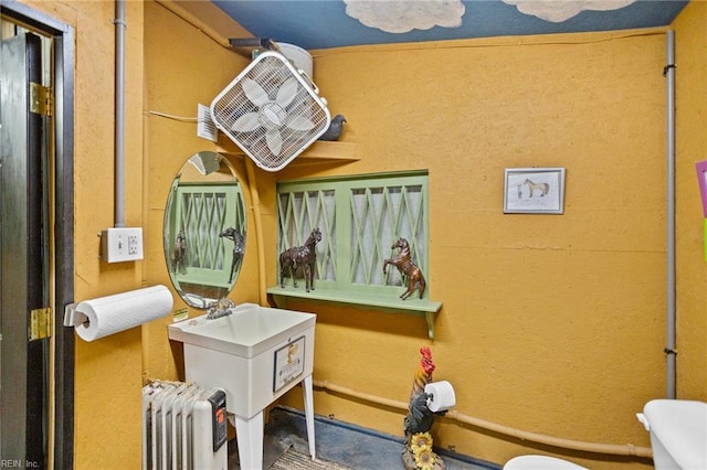 253 S George Washington Hwy, Chesapeake, VA 23323 - bathroom featuring toilet and radiator heating unit