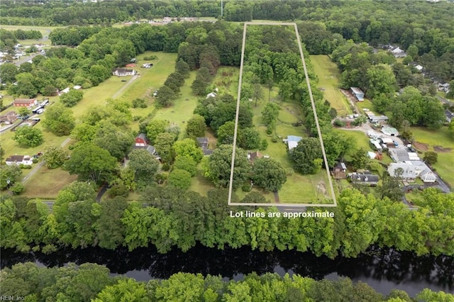 253 S George Washington Hwy, Chesapeake, VA 23323 - view of property location with property parcel outlined, a nearby body of water, and a tree filled landscape