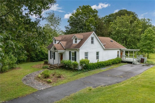 253 S George Washington Hwy, Chesapeake, VA 23323 - view of front facade featuring a front lawn, a pergola, and asphalt driveway