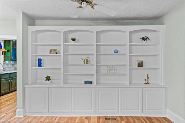 253 S George Washington Hwy, Chesapeake, VA 23323 - detailed view of wood finished floors, ceiling fan, and a textured ceiling