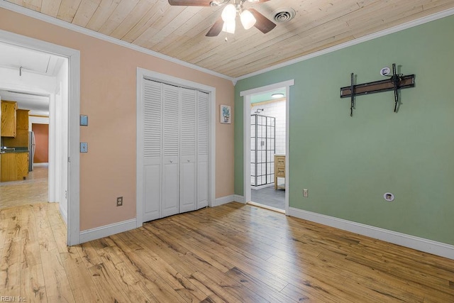 27195 Dogwood Bend Rd, Franklin, VA 23851 - unfurnished bedroom featuring crown molding, light wood-style flooring, baseboards, attic access, and wooden ceiling