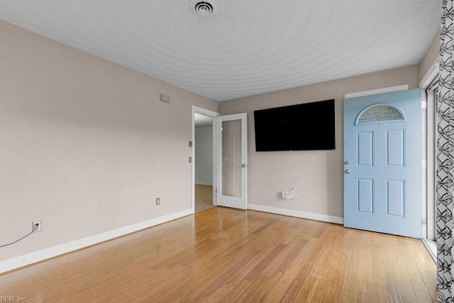27195 Dogwood Bend Rd, Franklin, VA 23851 - empty room featuring baseboards and light wood finished floors