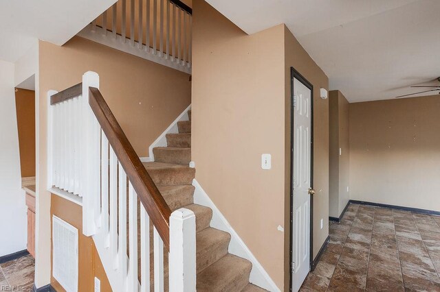 1705 Ocean Bay Dr, Virginia Beach, VA 23454 - stairway with baseboards and stone finish floors