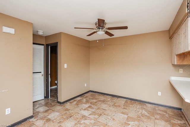 1705 Ocean Bay Dr, Virginia Beach, VA 23454 - spare room with ceiling fan, baseboards, and light stone finish flooring