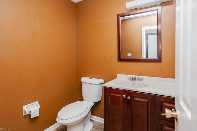 1705 Ocean Bay Dr, Virginia Beach, VA 23454 - bathroom featuring vanity, toilet, tile patterned flooring, and baseboards
