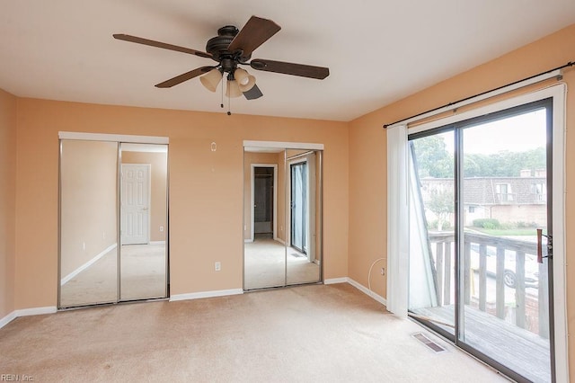 1705 Ocean Bay Dr, Virginia Beach, VA 23454 - unfurnished bedroom with access to exterior, light colored carpet, baseboards, and ceiling fan