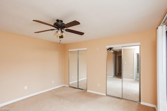 1705 Ocean Bay Dr, Virginia Beach, VA 23454 - unfurnished bedroom with multiple closets, light carpet, baseboards, and a ceiling fan