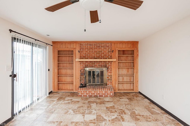 1705 Ocean Bay Dr, Virginia Beach, VA 23454 - unfurnished living room featuring built in shelves, a brick fireplace, ceiling fan, baseboards, and stone finish floors