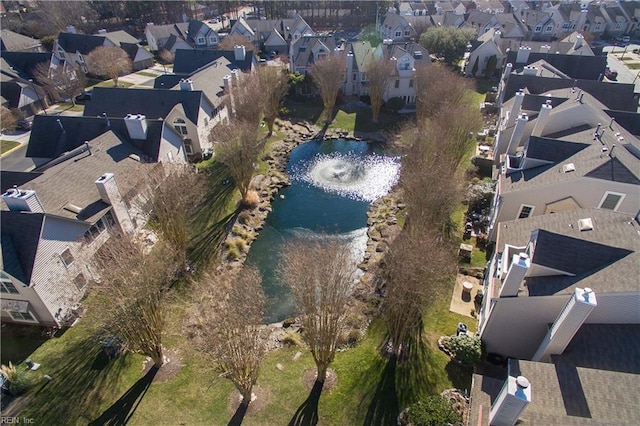 aerial view of property's location with nearby suburban area