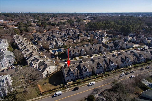 aerial view of property's location featuring nearby suburban area
