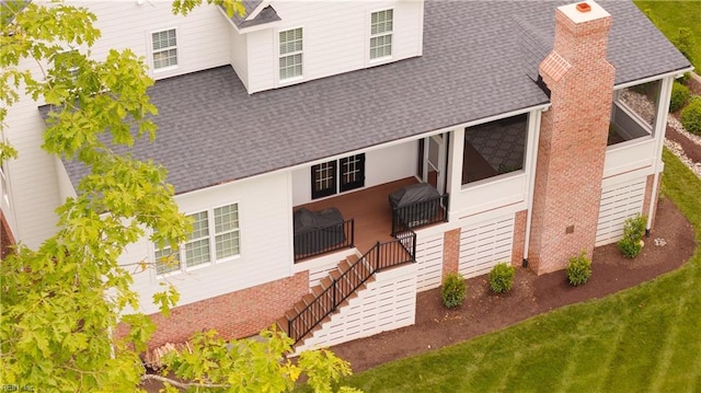 116 Formby, Williamsburg, VA 23188 - view of front of home with roof with shingles, a front yard, a chimney, and stairs
