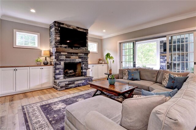 116 Formby, Williamsburg, VA 23188 - living area featuring healthy amount of natural light, light wood finished floors, crown molding, a fireplace, and recessed lighting