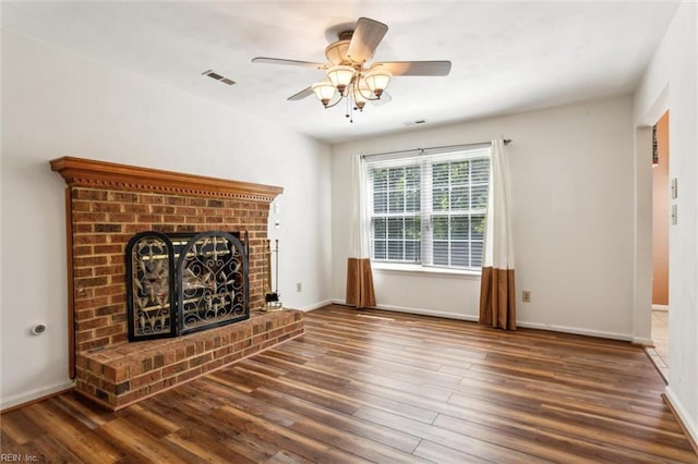 6017 Glen View Dr, Virginia Beach, VA 23464 - unfurnished living room featuring wood finished floors, a ceiling fan, baseboards, and a fireplace