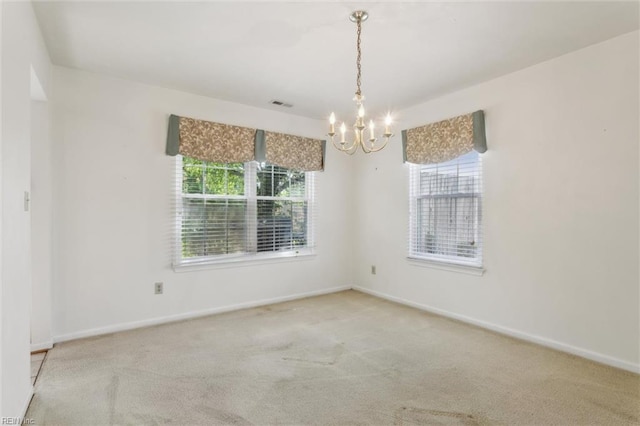 6017 Glen View Dr, Virginia Beach, VA 23464 - spare room featuring a chandelier, plenty of natural light, and carpet