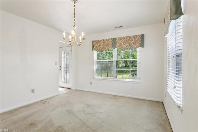 6017 Glen View Dr, Virginia Beach, VA 23464 - spare room featuring a chandelier, carpet floors, and baseboards