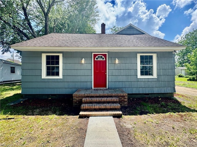 4213 Nautilus Ave, Chesapeake, VA 23325 - view of front of home with roof with shingles, a chimney, and crawl space