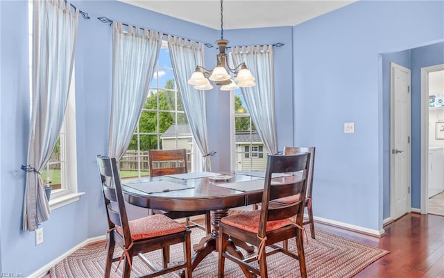 2230 Angler Ln, Chesapeake, VA 23323 - dining space with a chandelier, baseboards, and wood finished floors