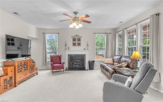 2230 Angler Ln, Chesapeake, VA 23323 - living room featuring plenty of natural light, carpet floors, and a fireplace with flush hearth