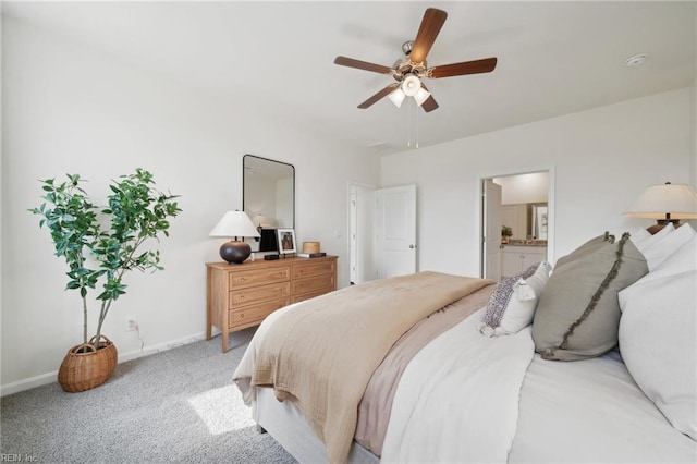 104 Genoa Dr, Elizabeth City, NC 27909 - bedroom with light carpet, baseboards, a ceiling fan, and connected bathroom
