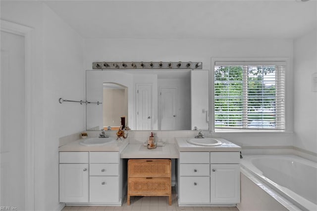 2537 Springhaven Dr, Virginia Beach, VA 23456 - bathroom with plenty of natural light, double vanity, a bath, and tile patterned floors