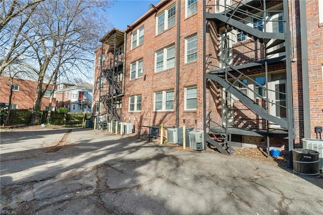 913 Spotswood Ave Unit 1, Norfolk, VA 23517 - view of building exterior featuring stairway and central AC unit