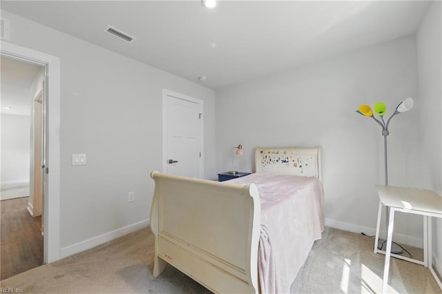 6729 Nolan Run, Gloucester, VA 23061 - bedroom with baseboards and carpet floors